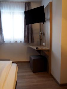 TV a/nebo společenská místnost v ubytování Gasthof Hotel Esterer