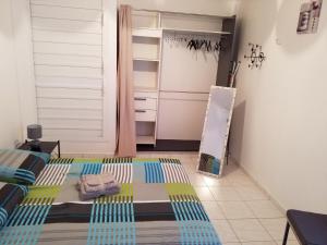 Postel nebo postele na pokoji v ubytování Appartement Centre Guadeloupe, accessible et proche