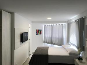 Una cama o camas en una habitación de Cupe Beach Flats