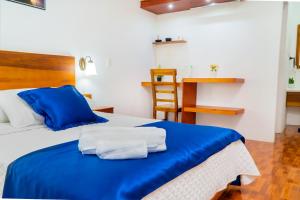 Voodi või voodid majutusasutuse Hotel Boutique Platanal toas