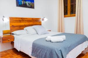 Voodi või voodid majutusasutuse Hotel Boutique Platanal toas