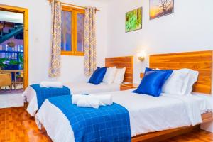 Voodi või voodid majutusasutuse Hotel Boutique Platanal toas