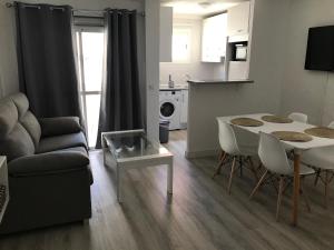 A seating area at APARTAMENTO SOL Y PLAYA