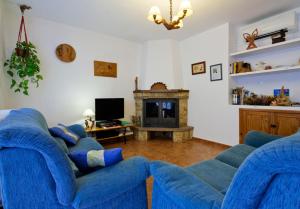 TV a/nebo společenská místnost v ubytování Hostal Río Mundo