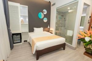 Ένα ή περισσότερα κρεβάτια σε δωμάτιο στο La Casa Tuy Hòa