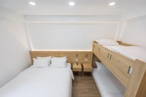 Chiangkhan River Walk Hotel客房内的一张或多张床位