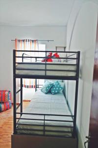 
A bunk bed or bunk beds in a room at Orange3 Hostel
