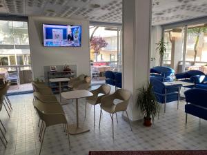 TV a/nebo společenská místnost v ubytování Hotel San Marco