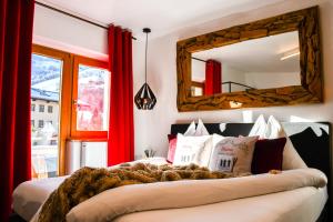 Łóżko lub łóżka w pokoju w obiekcie Boutique Hotel Pinzgauerhof