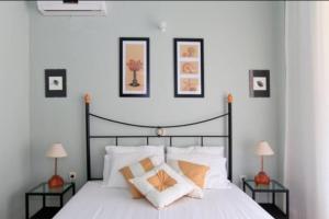 Postel nebo postele na pokoji v ubytování Villa Tsampika