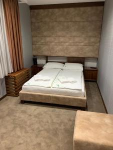 Ein Bett oder Betten in einem Zimmer der Unterkunft Apartman LN Zlatibor