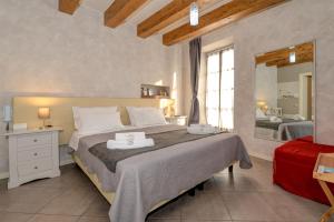 Voodi või voodid majutusasutuse Il Nido dei Gufi Bed and Breakfast toas