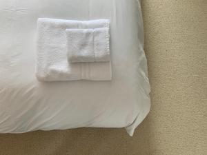 Ein Bett oder Betten in einem Zimmer der Unterkunft The Gate Cornwall