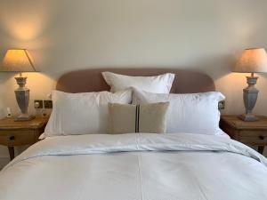 Ein Bett oder Betten in einem Zimmer der Unterkunft The Gate Cornwall