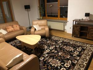 Ein Sitzbereich in der Unterkunft Ferienwohnung Tom