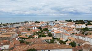 an aerial view of a town with roofs at La Martinoise Patio in Saint-Martin-de-Ré