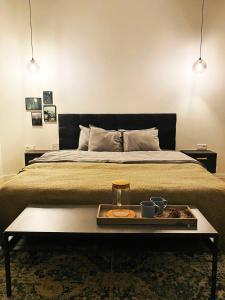 A bed or beds in a room at Apartmány Elli