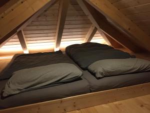 Un pat sau paturi într-o cameră la Balance Apartments by M&A - Ferienhaus Dohrenbach
