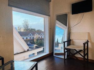 TV a/nebo společenská místnost v ubytování The Balcony BnB