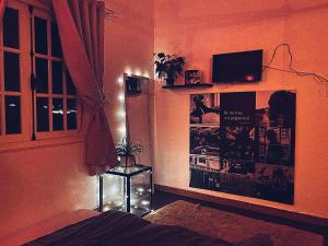 TV a/nebo společenská místnost v ubytování The Balcony BnB