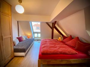 Ein Bett oder Betten in einem Zimmer der Unterkunft Leipziger Logis