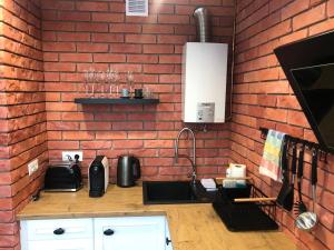 Kuchyňa alebo kuchynka v ubytovaní Apartamencik - Kowary