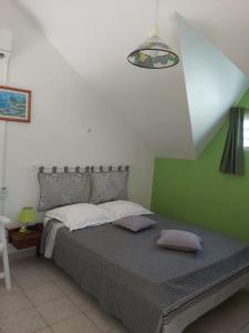 Postel nebo postele na pokoji v ubytování Gîte Muskad