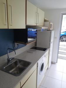 Kuhinja ili čajna kuhinja u objektu Gîte Muskad