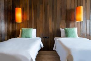 Letto o letti in una camera di Baan Ploy Sea