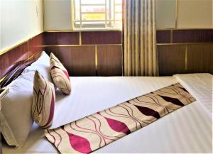 Postel nebo postele na pokoji v ubytování Hong Dao 2 Hotel