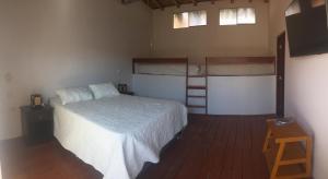 Postel nebo postele na pokoji v ubytování Origenes Spa & Lodging