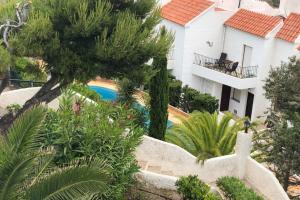 Zahrada ubytování CasaMarga San José Precioso apartamento con piscina y vistas al mar