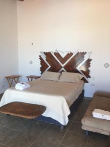 Postel nebo postele na pokoji v ubytování Origenes Spa & Lodging