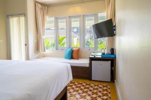 Letto o letti in una camera di Sai Kaew Beach Resort