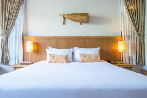 Letto o letti in una camera di Sai Kaew Beach Resort
