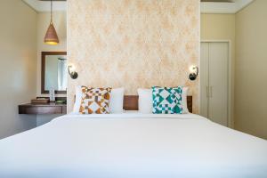 Letto o letti in una camera di Sai Kaew Beach Resort