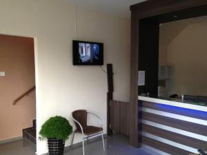 TV a/nebo společenská místnost v ubytování NGS Hotel + 12 fotografií