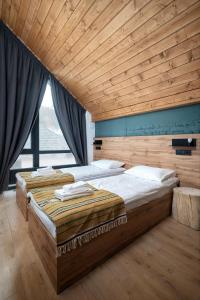 Voodi või voodid majutusasutuse Baza Smart Hotel toas