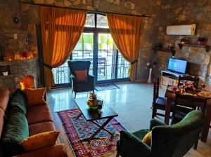 Et opholdsområde på Villa Kayakoy 1 - Private Stone Villa