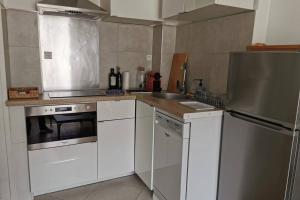 Η κουζίνα ή μικρή κουζίνα στο Lovely Flat in Paris - City center - Nation-Picpus +8 φωτογραφίες