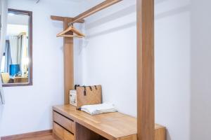 a room with a dressing table and a mirror at Ao Prao Resort in Ko Samed