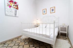 Postel nebo postele na pokoji v ubytování Can Romaguera + 17 fotografií