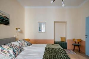Postel nebo postele na pokoji v ubytování Apartment A.B.S. Secret Oasis