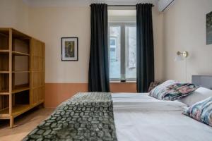 Postel nebo postele na pokoji v ubytování Apartment A.B.S. Secret Oasis