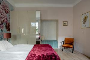 Postel nebo postele na pokoji v ubytování Apartment A.B.S. Secret Oasis