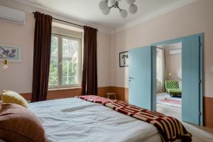 Postel nebo postele na pokoji v ubytování Apartment A.B.S. Secret Oasis