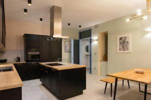 Kuchyň nebo kuchyňský kout v ubytování Apartment A.B.S. Secret Oasis