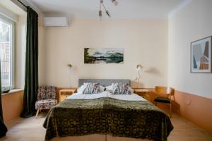 Postel nebo postele na pokoji v ubytování Apartment A.B.S. Secret Oasis