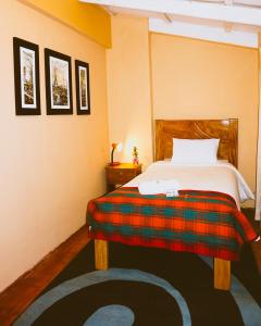 Llit o llits en una habitació de Eco Aventura Hostel Cusco