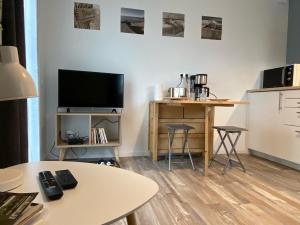 Kuchyň nebo kuchyňský kout v ubytování Résidence des 3 îles, en plein centre-ville, à 5 min des plages, 3 appartements neufs
